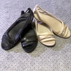 2 pairs of crocs sandals size 7 standard fit.